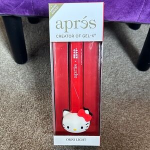 NIB Aprés Hello Kitty Omni Light - Red